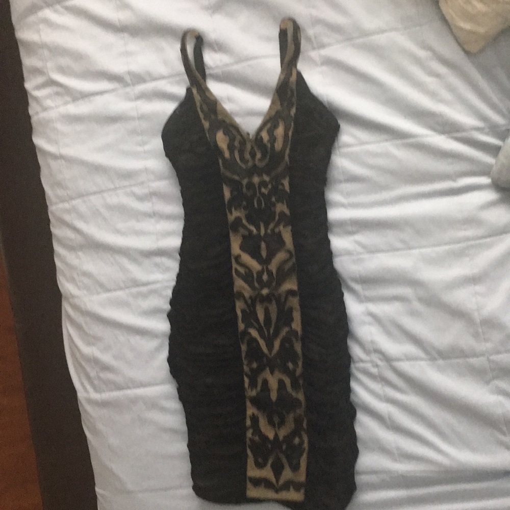 Bebe Black and nude dress.